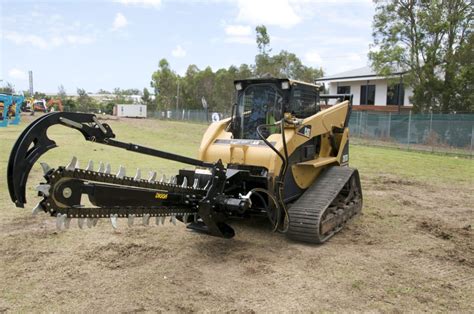 trencher attachment for skid steer|caterpillar skid steer aerator attachment.